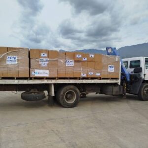 Tamarac Mayor Michelle J. Gomez packs kit with encouraging message fftp emergency relief venezuela